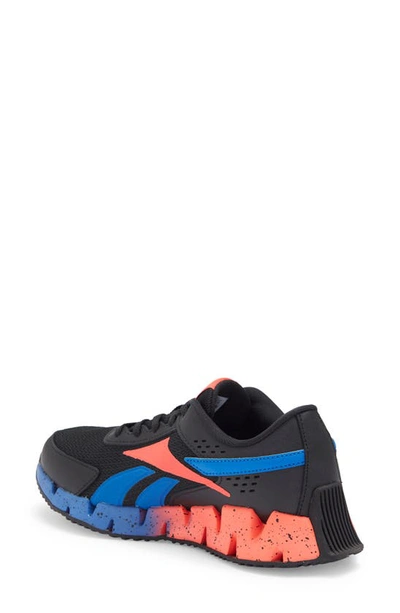 Shop Reebok Kids' Zig Dynamica 2.0 Athletic Sneaker In Black/ Electric Blue