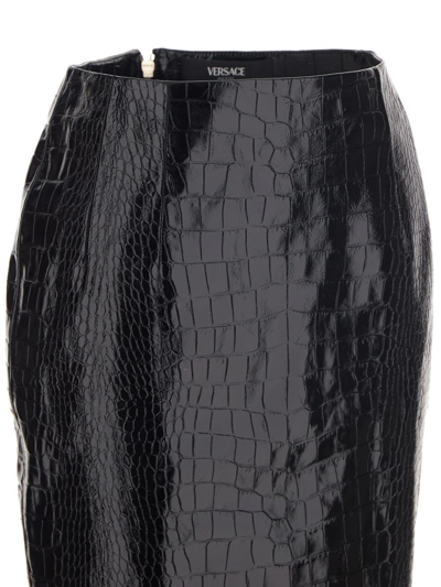 Shop Versace Croco Print Leather Midi Skirt In Black