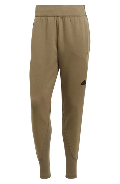 Shop Adidas Sportswear Z.n.e. Premium Performance Pants In Olive Strata