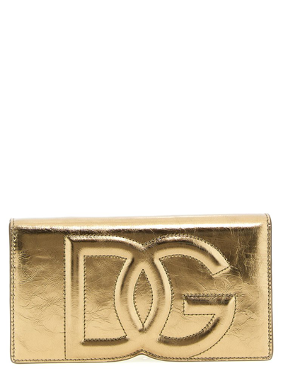 Shop Dolce & Gabbana Dg Logo Embossed Phone Bag In Gold