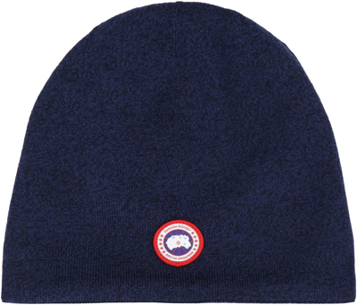 Shop Canada Goose Logo Patch Knitted Beanie In Blue