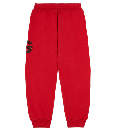 Shop Dolce & Gabbana Logo Embellished Jersey Sweatpants In Red