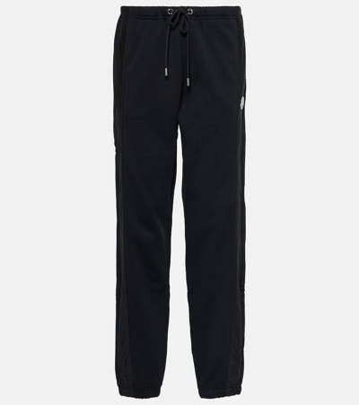 Shop Moncler Cotton-blend Sweatpants In Black