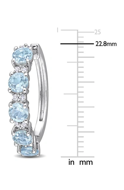 Delmar Sterling Silver Sky Blue Topaz & White Topaz Huggie Hoop Earrings In Blue