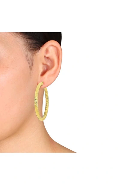Shop Delmar Twisted Hoop Earrings In Gold