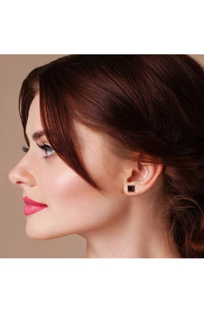 Shop Delmar Sterling Silver Emerald-cut Garnet Stud Earrings In Red