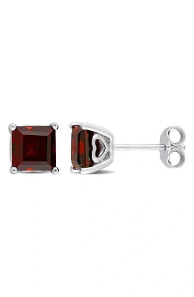 Shop Delmar Princess Cut Garnet Stud Earrings In Red