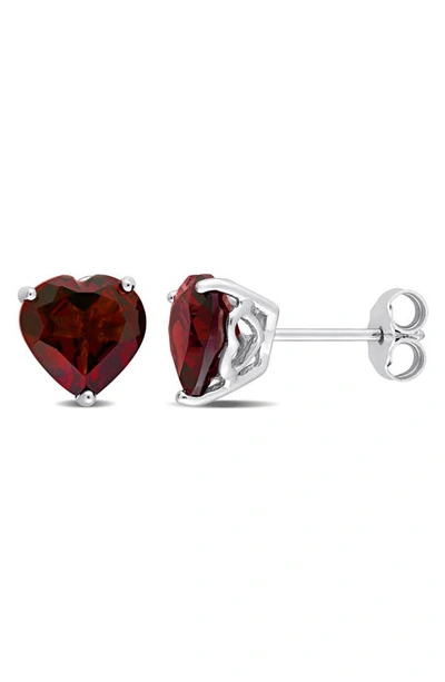 Shop Delmar Heart Cut Garnet Stud Earrings In Red