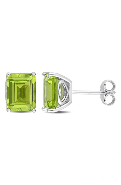 Shop Delmar Emerald Cut Peridot Stud Earrings In Green