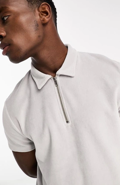 Shop Asos Design Velour Zip Polo In Light Grey