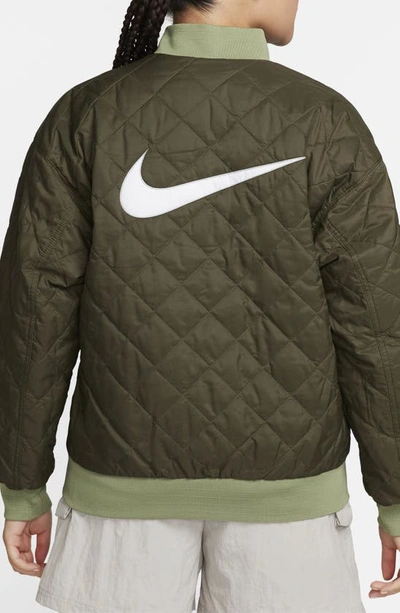 Shop Nike Sportswear Reversible Bomber Jacket In Oil Green/ Cargo Khaki/ White