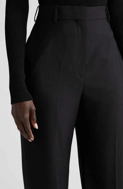 Shop Alexander Mcqueen Relaxed High Waist Wide Leg Wool Trousers In 1000 Black