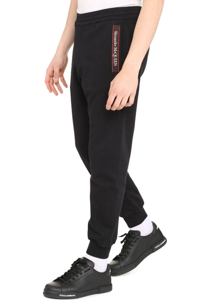 Shop Alexander Mcqueen Stretch Cotton Track-pants In Black