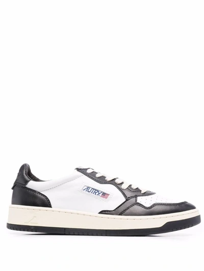Shop Autry Sneakers Low Top In Black White