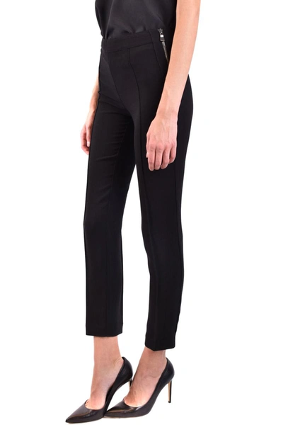 Shop Boutique Moschino Trousers In Black