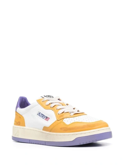 Shop Autry Color-block Yellow And Purple  'medalist' Low Top Sneakers In Cow Leather
