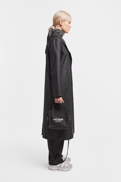 Shop Stutterheim Mayfair Trench Coat In Black