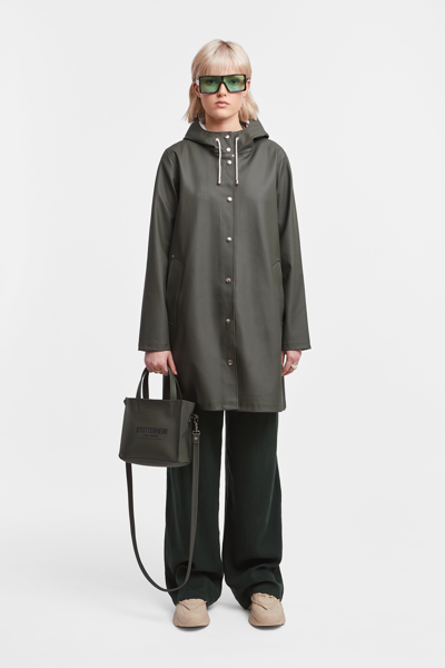 Shop Stutterheim Mosebacke Raincoat In Green