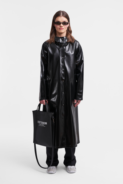 Shop Stutterheim Mosebacke Long Print Opal Raincoat In Black