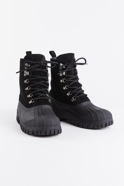 Shop Stutterheim Patrol Boot Suede In Black