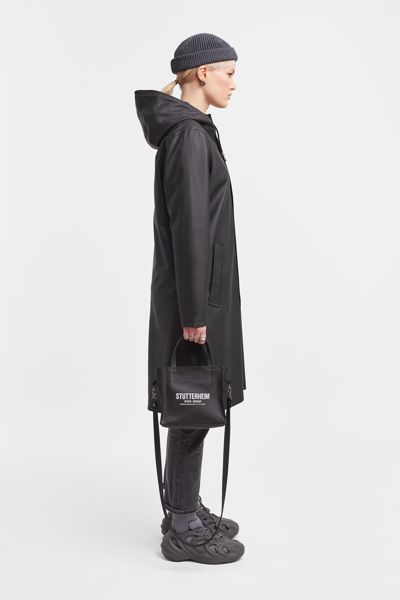 Shop Stutterheim Stockholm Long Raincoat In Black
