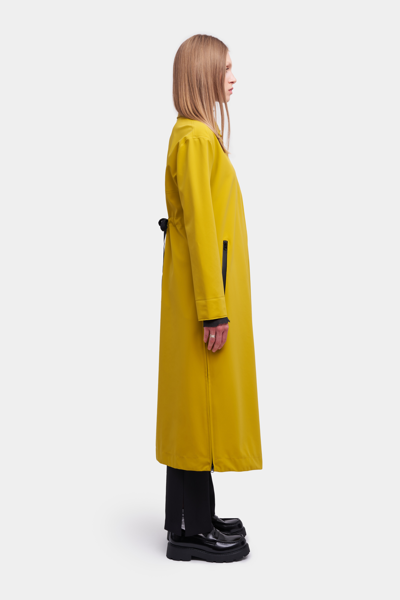 Shop Stutterheim Hornstull Matte Long Raincoat Gold In Golden Palm