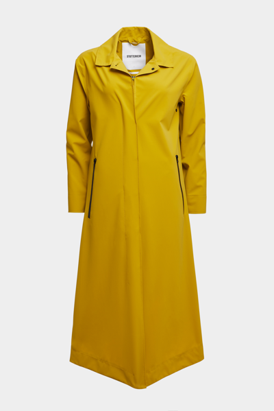 Shop Stutterheim Hornstull Matte Long Raincoat Gold In Golden Palm