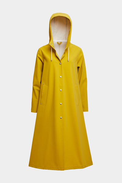 Shop Stutterheim Mosebacke Long Matte Raincoat Gold In Golden Palm