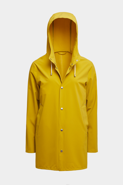 Shop Stutterheim Stockholm Lightweight Matte Raincoat Gold In Golden Palm