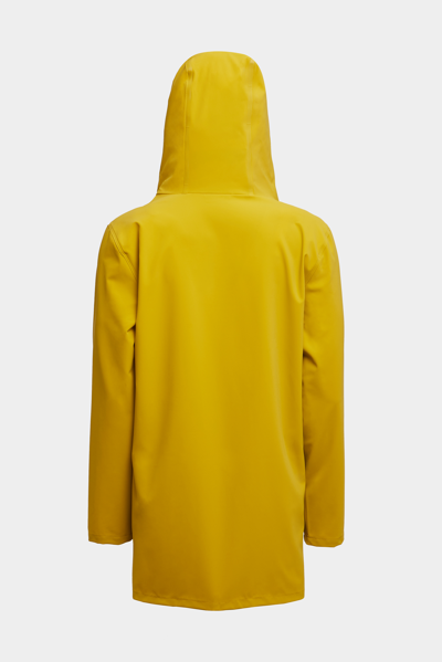 Shop Stutterheim Stockholm Lightweight Matte Raincoat Gold In Golden Palm