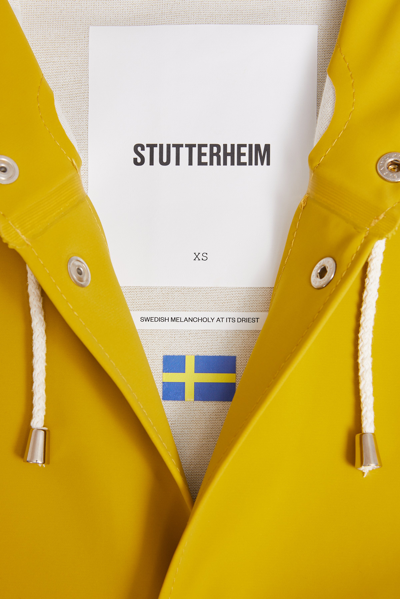 Shop Stutterheim Stockholm Long Matte Print Raincoat Gold In Golden Palm