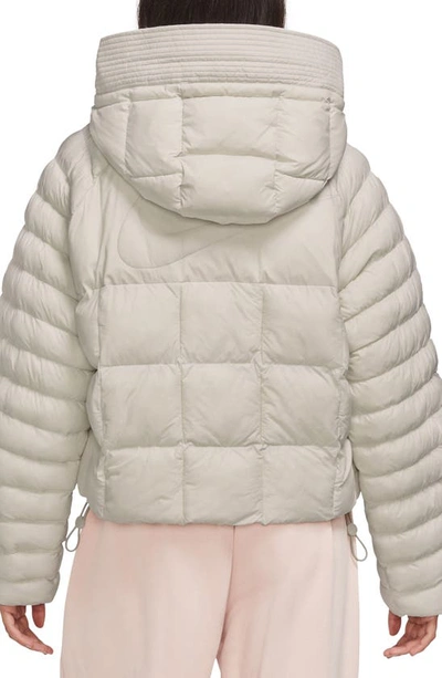 Shop Nike Sportswear Essential Primaloft® Water Repellent Puffer Coat In Light Natural/ White