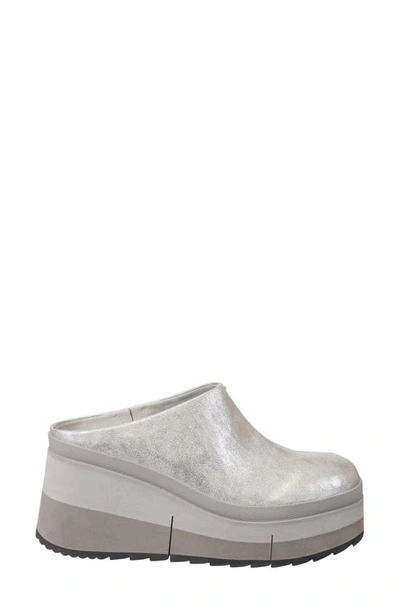 Shop Naked Feet Coach Wedge Mule In Silver