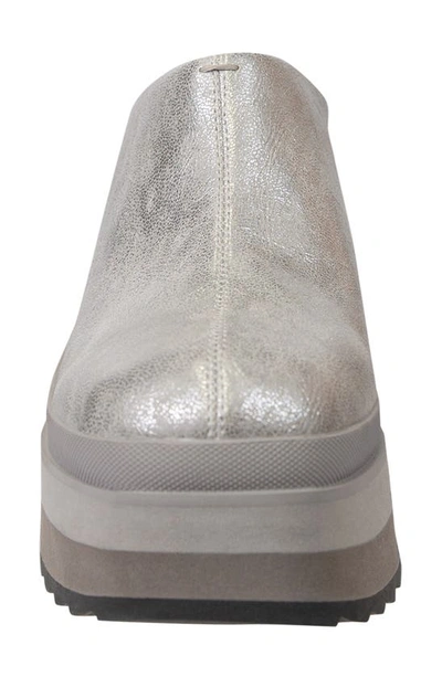 Shop Naked Feet Coach Wedge Mule In Silver