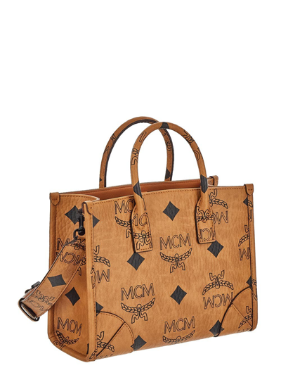 Shop Mcm Small Munchen Maxi Visetos Tote Bag In Brown