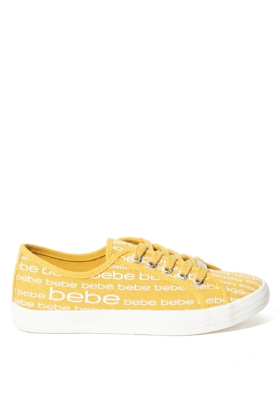 Shop Bebe Daylin Logo Sneakers In Yellow