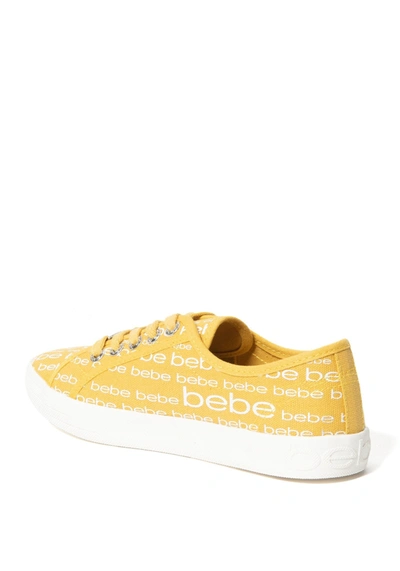Shop Bebe Daylin Logo Sneakers In Yellow