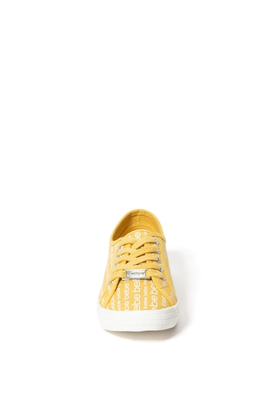 Shop Bebe Daylin Logo Sneakers In Yellow