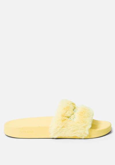 Shop Bebe Furiosa Faux Fur Slides In Yellow