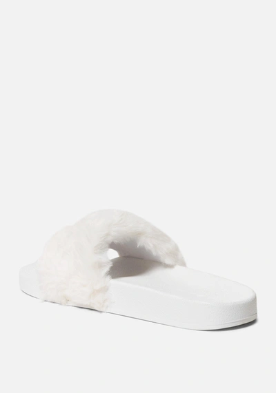 Shop Bebe Furiosa Faux Fur Slides In White