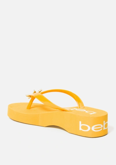 Shop Bebe Kim Wedge Flip Flops In Yellow