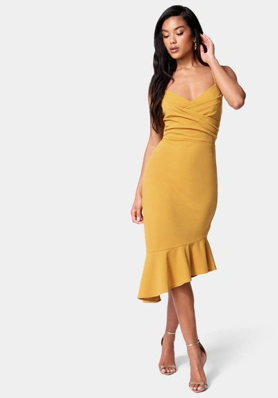 Shop Bebe Angled Flounce Midi Dress In Mustard