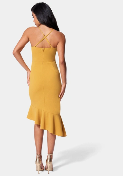 Shop Bebe Angled Flounce Midi Dress In Mustard