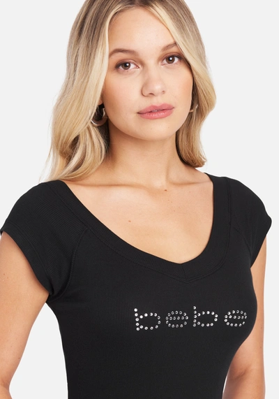 Shop Bebe Short Sleeve Logo Dress In Black