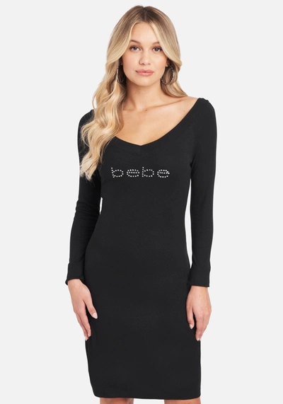 Shop Bebe Long Sleeve Logo Dress In Black