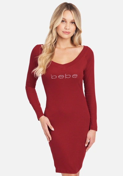Shop Bebe Long Sleeve Logo Dress In Berry