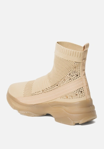 Shop Bebe Aspen Sneakers In Nude Flyknit