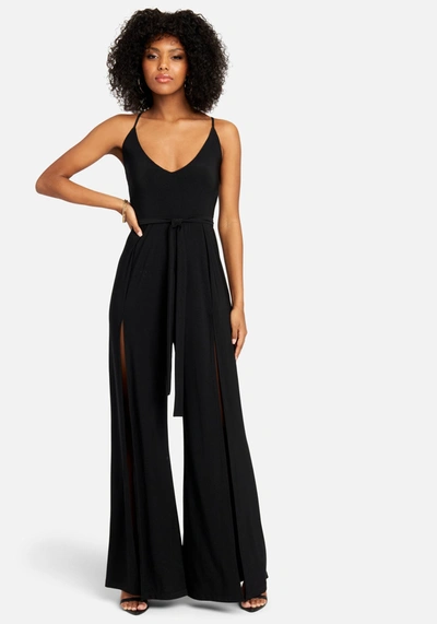 Bebe High Slit V-neck Cami Strap Jumpsuit In Black