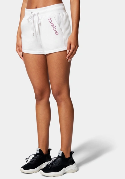 Shop Bebe Logo Nailhead Shorts In White