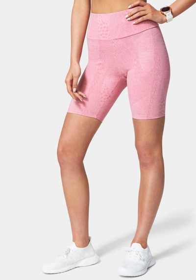 Bebe Logo Embossed Snakeskin Biker Short In Embossed Orchid